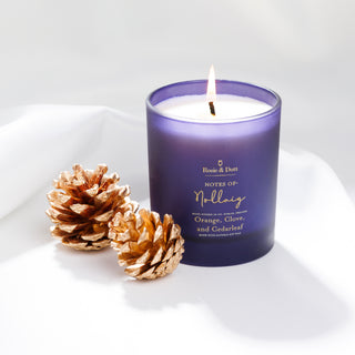 Notes of Nollaig Christmas Candle