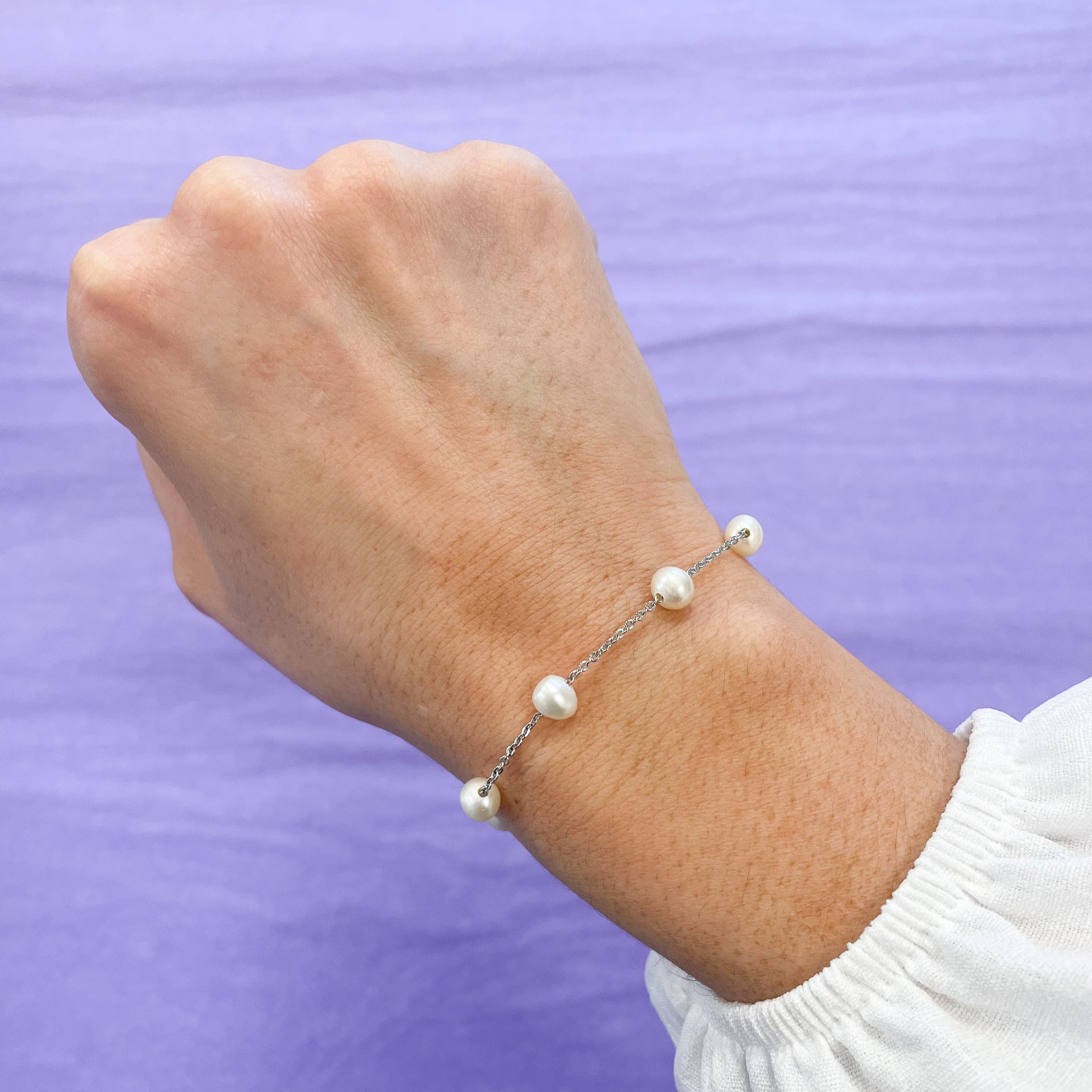 Delta Sigma Theta Pearl Bracelet with Silver Shield – Rosa's Greek  Boutique, Inc.